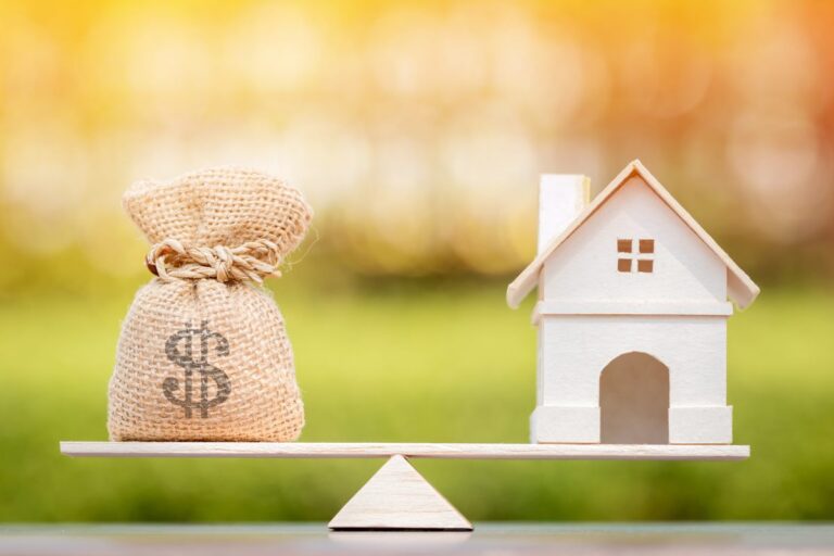 Couple deciding whether to sell their home before buying another